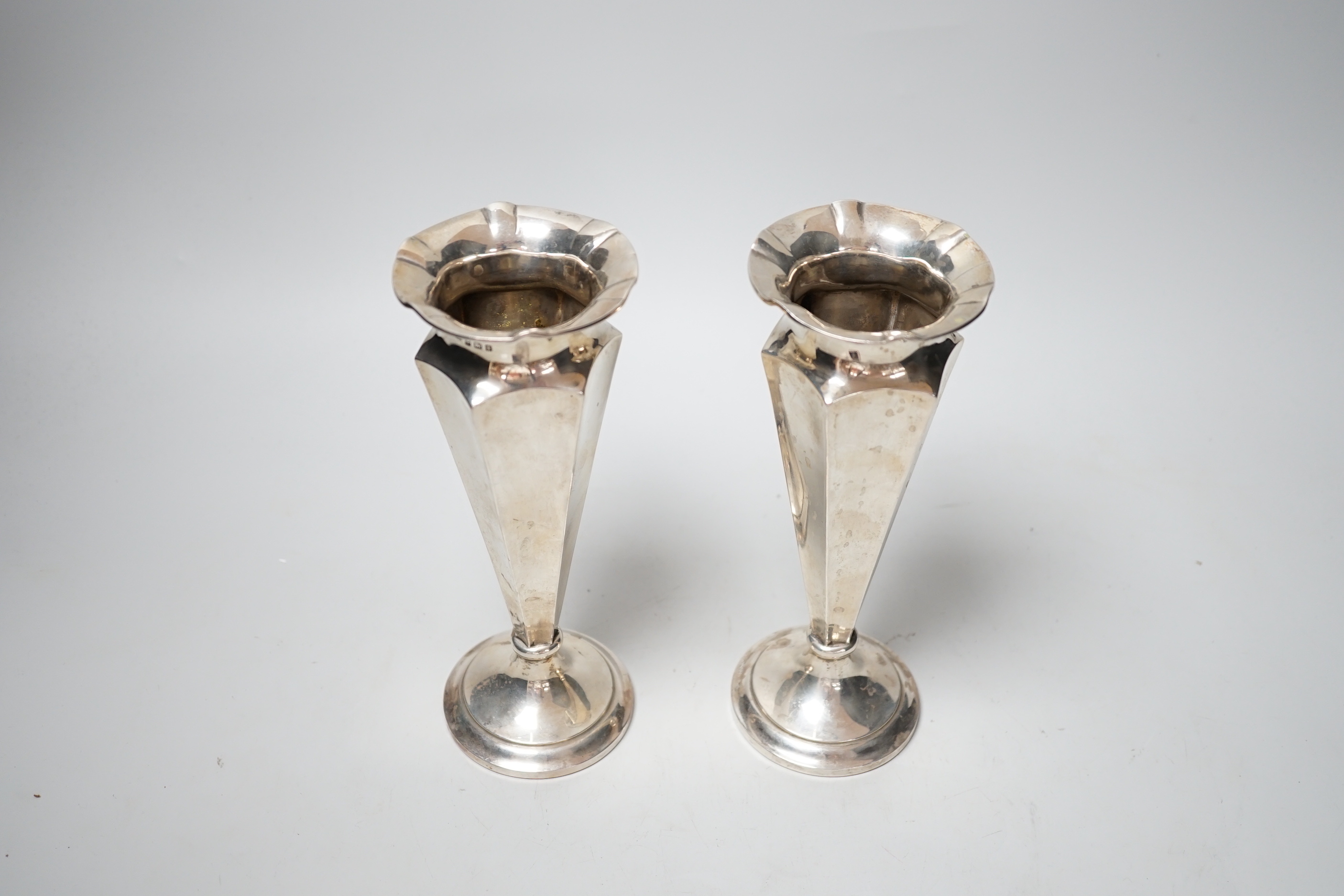 A pair of George V silver mounted spill vases, Deakin & Francis, Birmingham, 1910, height 20.4cm, weighted.